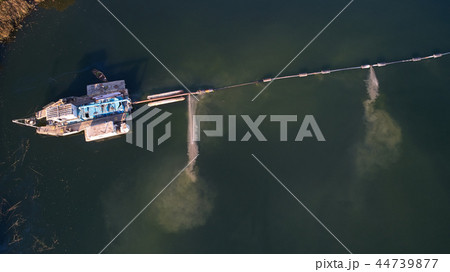 On the river there are works on extraction of sand. Works dredge On the river there are works on extraction of sand. Works dredge 44739877