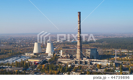 The thermoelectric plant with big chimneys in forest 44739896