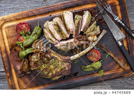 Barbecue tomahawk pork steak with vegetable Barbecue tomahawk pork steak with vegetable 44745669