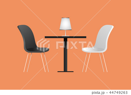 Black and white chairs and table in cafe 44749263