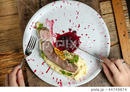 Men's hands holding fork and knife Men's hands holding fork and knife 44749874