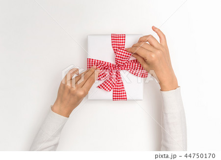 Making a Christmas gift box 44750170