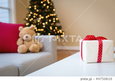 Christmas gift box on a table Christmas gift box on a table 44750610