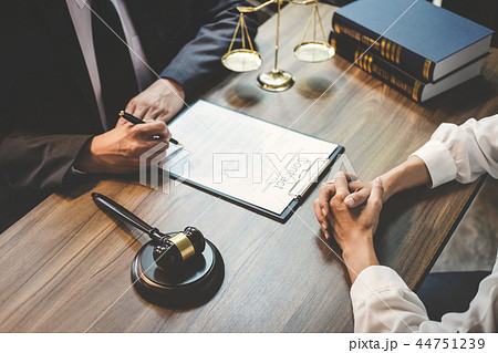 Businesswoman and Male lawyer or judge consult having team meeti 44751239