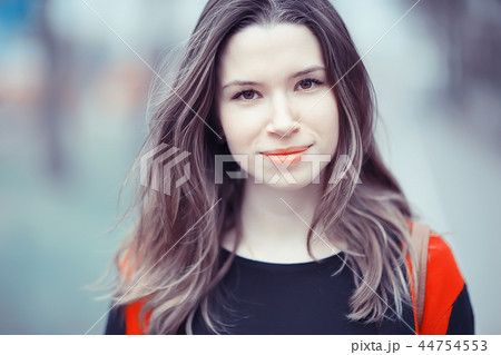 girl in coat outdoor / autumn photo model girl adult posing in park, girl in coat with long hair girl in coat outdoor / autumn photo model girl adult posing in park, girl in coat with long hair 44754553