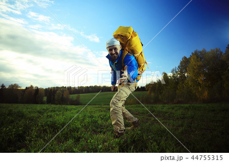 man with backpack, tourist, brutal journey, hike, the concept of active male recreation, portrait of a severe, brutal man, guy preparing equipment for the mountains man with backpack, tourist, brutal journey, hike, the concept of active male recreation, portrait of a severe, brutal man, guy preparing equipment for the mountains 44755315