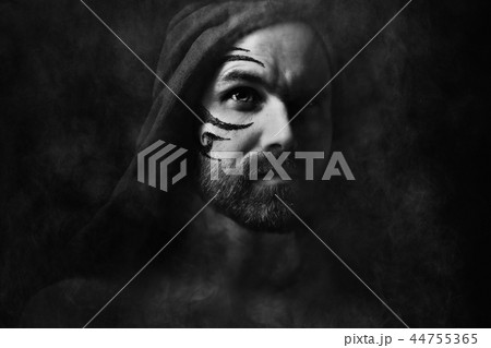 tattoo on the face, male portrait in the form of an assassin, cosplay, tattooed brutal man, guy with a tattooed face tattoo on the face, male portrait in the form of an assassin, cosplay, tattooed brutal man, guy with a tattooed face 44755365