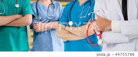 Doctor working in hospital with other doctors. Doctor working in hospital with other doctors. 44755786