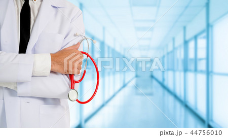 Young male doctor working at the hospital. Young male doctor working at the hospital. 44756010