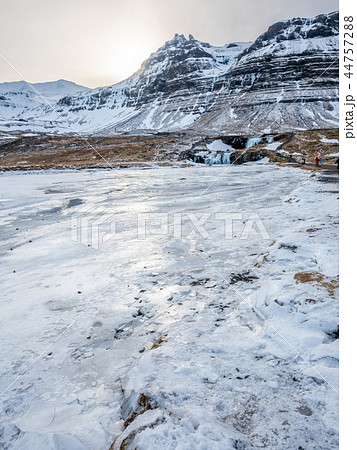 Kirkjufellfoss waterfall in winter, Iceland 44757288