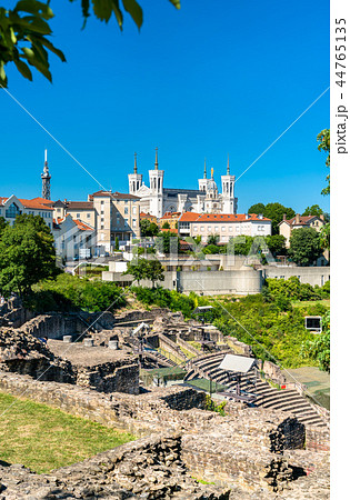 The Ancient Theatre and the Notre-Dame Basilica at Fourviere - Lyon, France 44765135