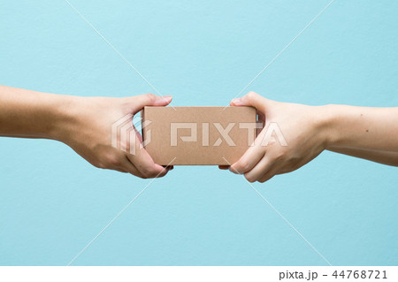 Woman hand received the brown box delivery Woman hand received the brown box delivery 44768721