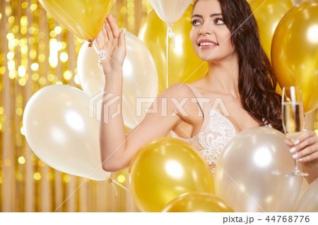 Woman in evening dress with champagne glasses - new year, celebr 44768776