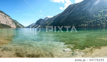 Stunning deep green waters of Konigssee, known as Germany deepest and cleanest lake Stunning deep green waters of Konigssee, known as Germany deepest and cleanest lake 44770295