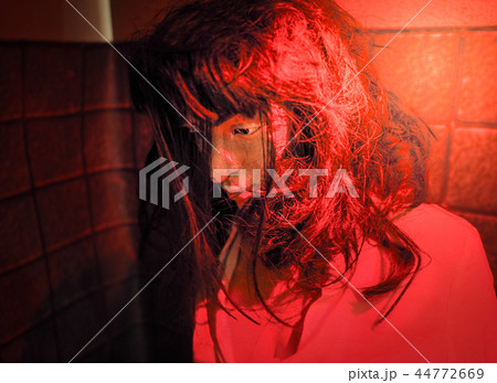 Scary ghost plastic mannequin in the red dark room 44772669