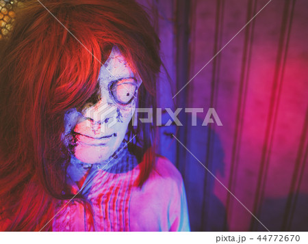 Scary ghost plastic mannequin in the red dark room 44772670