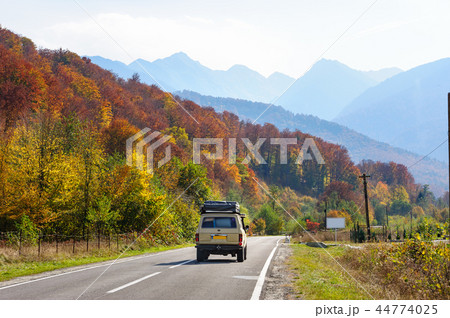 Car in the forest at Transfagarasan road 44774025