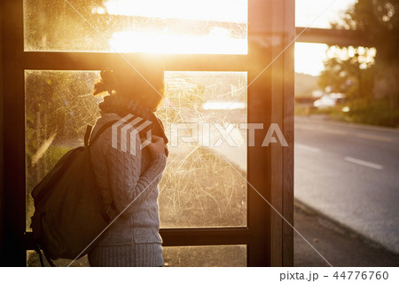 Girl on a bus stop Girl on a bus stop 44776760