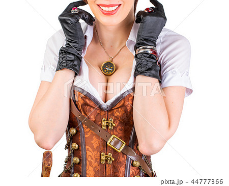 steampunk woman wearing vintage corset and goggles 44777366