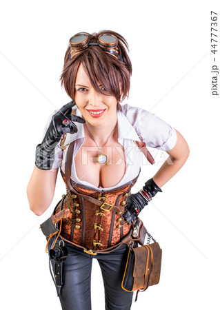 steampunk woman wearing vintage corset and goggles 44777367