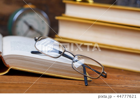 Open book ready for reading on the desk Open book ready for reading on the desk 44777621