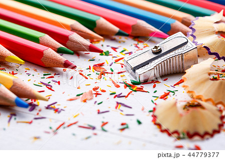 Pile of sharp coloured drawing pencils on table. Pile of sharp coloured drawing pencils on table. 44779377