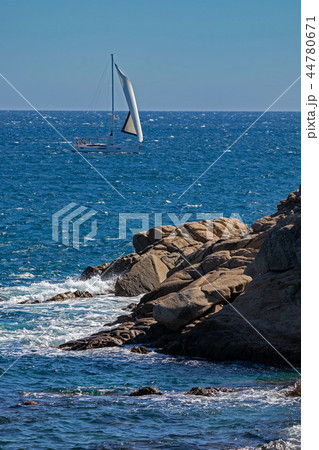 Nice sailboat on the Spanish ocean in Costa Brava Nice sailboat on the Spanish ocean in Costa Brava 44780671