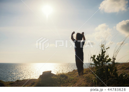 happy little boy look at sunset and sea 44783628