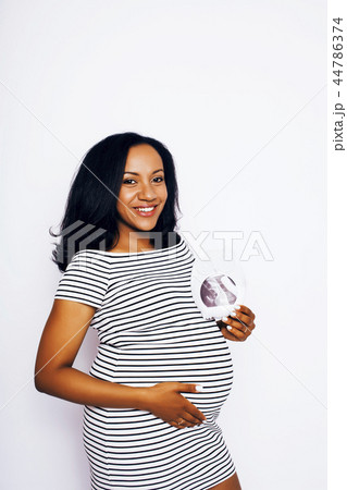 young pretty african american woman pregnant happy smiling, posi 44786374