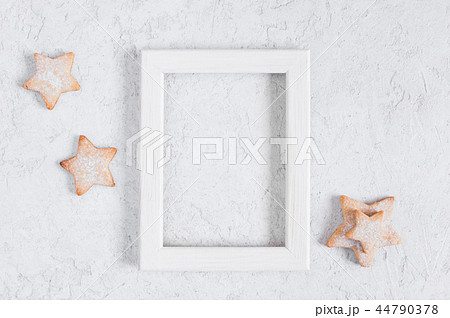 White background with frame and cookies-stars White background with frame and cookies-stars 44790378