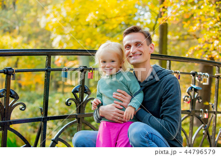 White little girl with father in a park 44796579