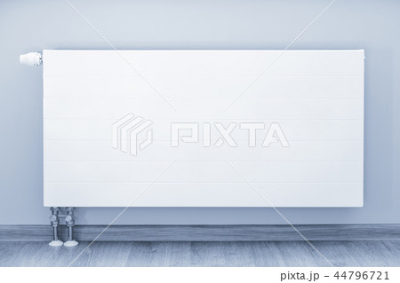 White radiator with a thermostat 44796721