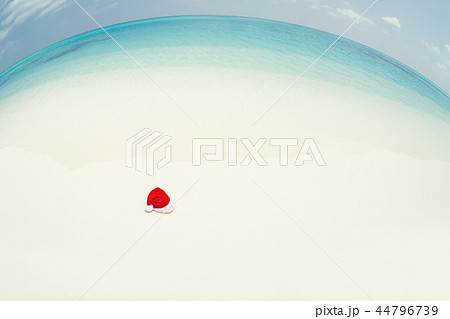 Santa Claus hat on perfect tropical bounty beach 44796739
