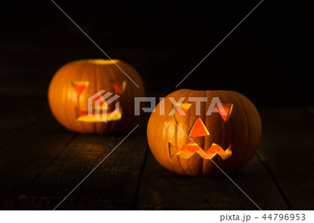 Two scary Halloween pumpkins Two scary Halloween pumpkins 44796953