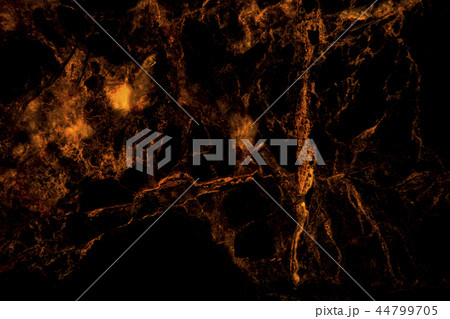 Gold marble natural texture for dark background. Gold marble natural texture for dark background. 44799705