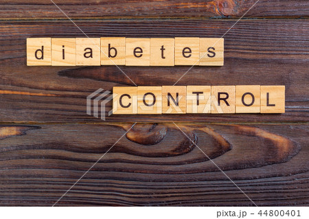 diabetes control text word made with wood blocks 44800401