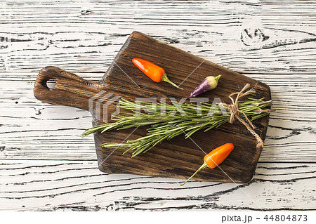Cutting Board, rosemary and spices.  44804873