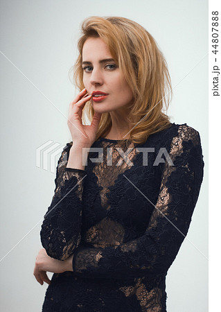 Beautiful woman in lace dress. Beautiful woman in lace dress. 44807888