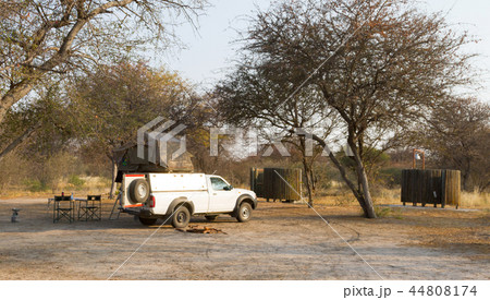 Offroad 4x4 vehicle with tent in the roof Offroad 4x4 vehicle with tent in the roof 44808174