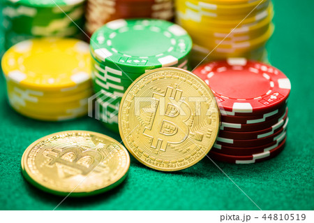 Casino chips and bitcoin cryptocurrency Casino chips and bitcoin cryptocurrency 44810519