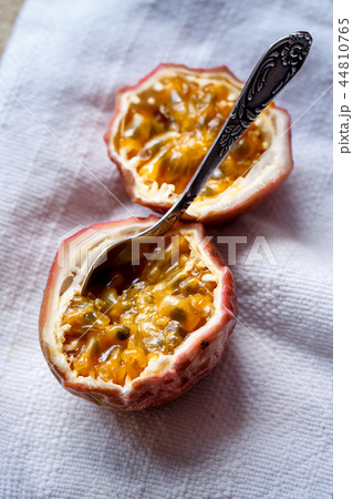 passion fruit on a white napkin, close-up 44810765
