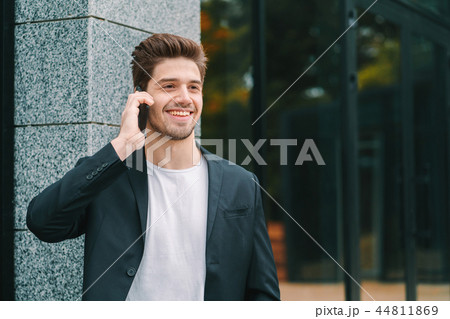 Close up portrait of businessman have conversation using mobile phone. Business guy in formal suit 44811869