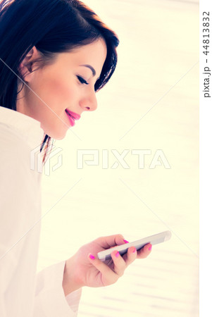 young woman with mobile phone 44813832