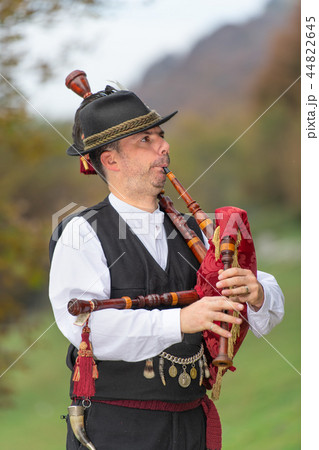 Typical player in traditional northern Italy bagpipe 44822645