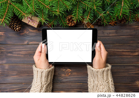 woman hands using tablet computer 44828626
