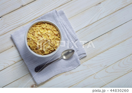 Cornflakes in a plate. Top view 44830260