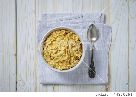 Cornflakes in a plate. Top view 44830261