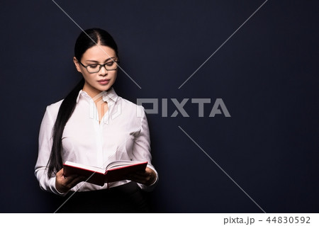 Businesswoman with a notebook 44830592