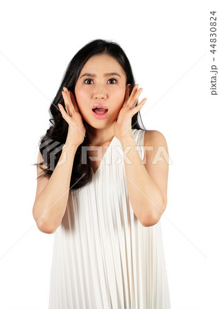Young woman with shocked face 44830824