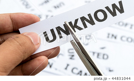 Unknow text or word meaning on paper in hand 44831044